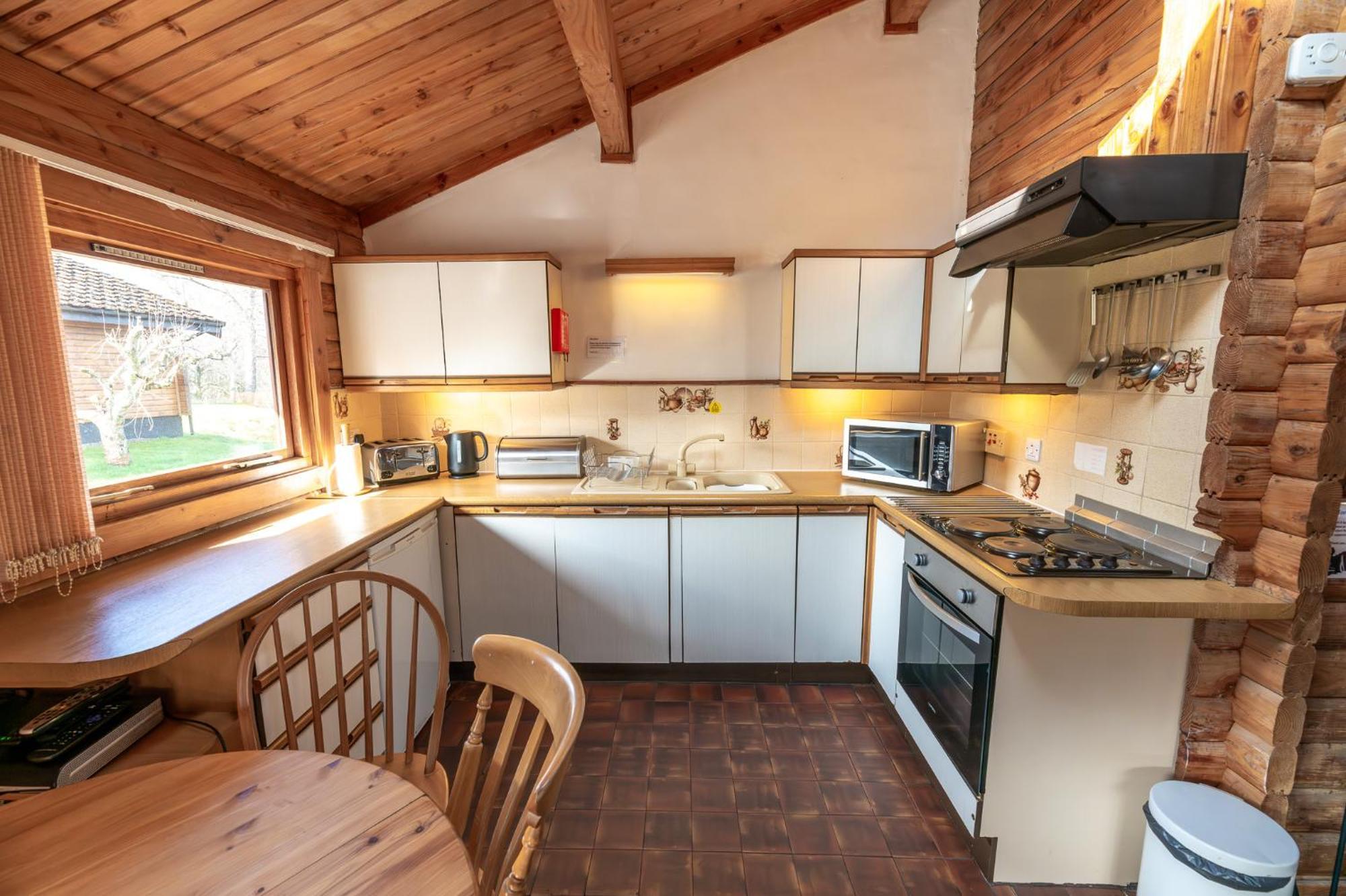 Loch Insh Chalets Ltd Кинкрейг Экстерьер фото